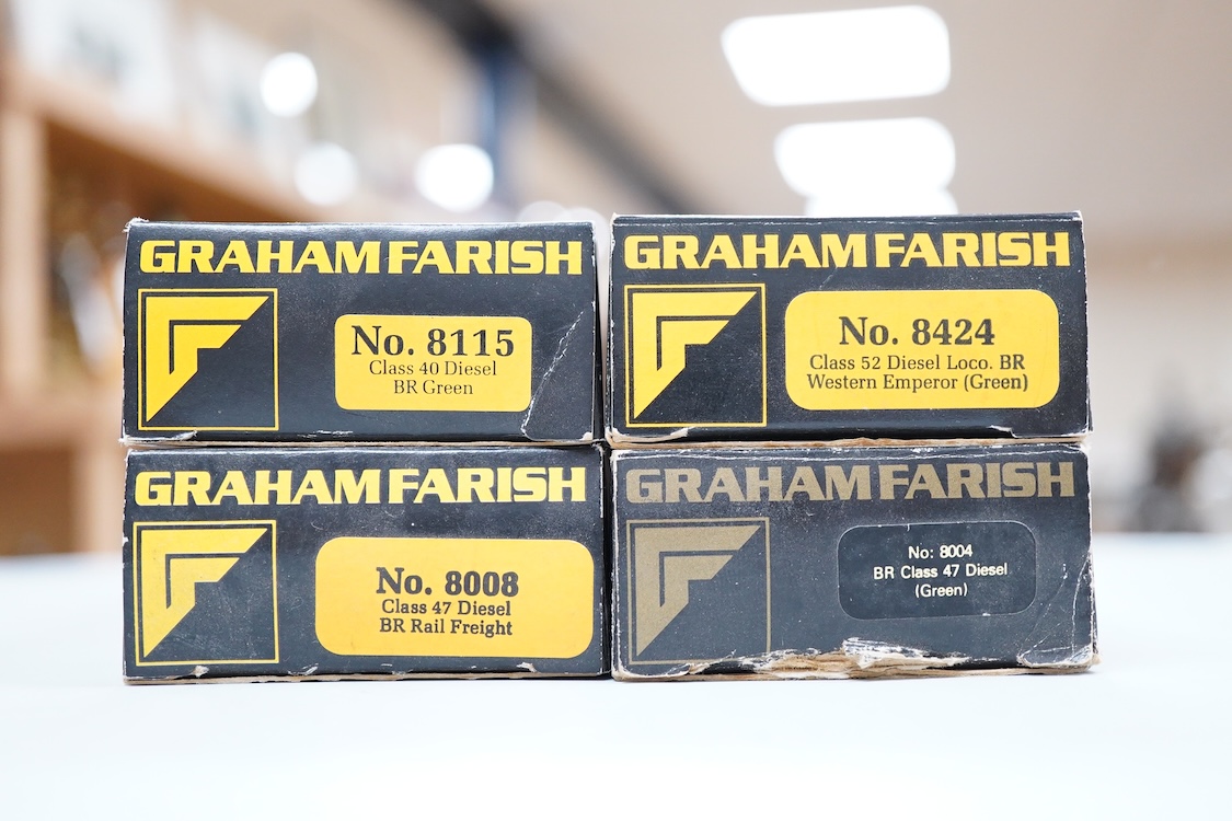 Four boxed Graham Farish N gauge railway diesel locomotives; a BR class 52, Western Emperor D1036 (8424), a BR class 47, D1662 (8004), a BR Rail Freight 47231, (8008) and a BR class 40, D348 (8115).